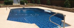 A finished custom in-ground pool